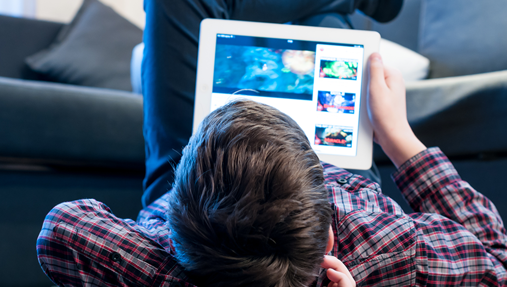 Young boy using a tablet device