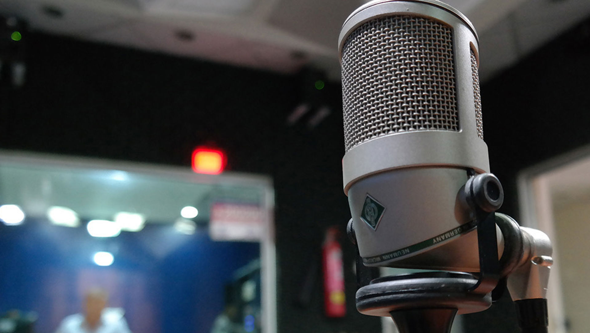 Close up shot of a radio microphone in a radio studio